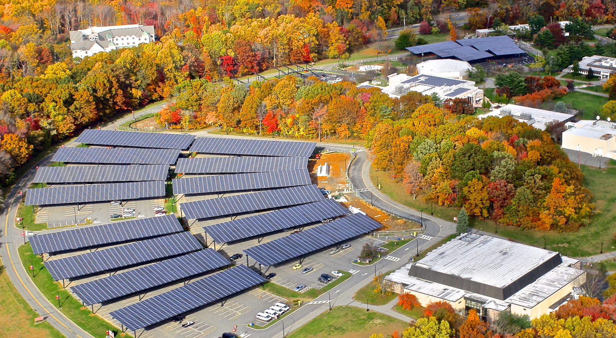 Aerial view of solar carport canopies at Morris County Community College in autumn